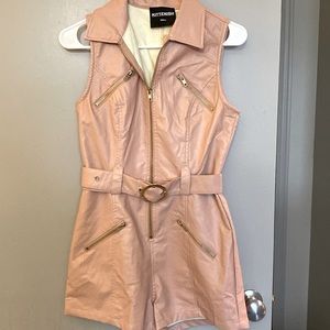 Small pink faux leather romper